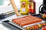 Sausage Roller Stainless Steel Rack Hot Dog Grill with Wooden Handle and 4 BBQ Skewers