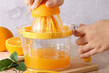 4-in-1 Citrus Squeezer Grater Multifunctional Hand Juicer Measuring Cup