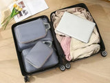 4Pcs Compression Packing Bags – Space-Saving Travel Organizers!