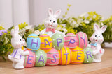 Bunny Holding Eggs and Happy Easter Decorations